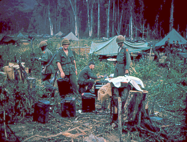 Chow Time
Not too often, but mermite cans with hot food flown into jungle LZs instead of the all-too-familiar C-rations.
