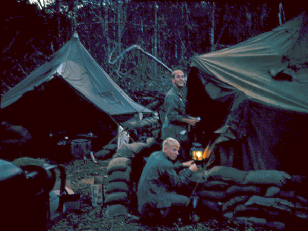 LZ 510B
Sp4 Walter W.  Lee (standing) and Sp4 John M. Waldman keeping the lamp lit.
