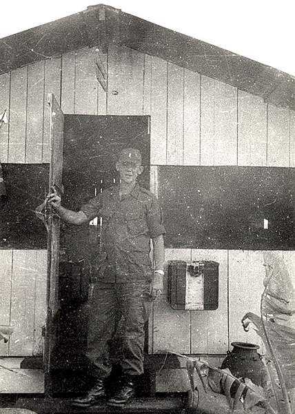 "Shine my boots??  Are you kidding?"
LtCol Holbrook wanted his officers to "look sharp" for the change of battery commanders in the next photo.  Probably the last time you'll see shined boots on my feet in Nam.
