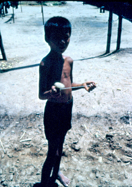 Duc Pho Orphanage
Met this child at the Orphanage.  Wanted to buy his toy top from him.  But he saw an empty sandbag in my jeep, so we traded instead.
