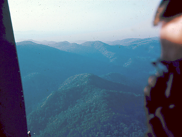 Combat Assault
Enroute to a CA in the Central Highlands.  The beautiful view enroute to a Combat Assault whereby the "shit hits the fan" in many cases.
