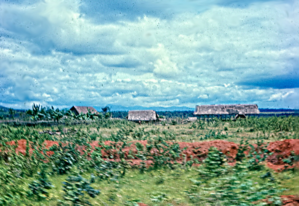 Convoy Duty
Montagnard village on the convoy route.  Note the use of elevated "longhouses".
