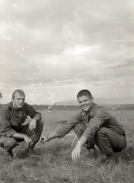 Field Chat
Lt Jim Daly (XO) and Lt Gary Dean Springer have a field chat. 
