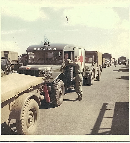 Wayne at work
Another shot of Sp5 Wayne Engum. The guy in jeep to left is SP/4 Geiger from Commo Section Message Center center. Took as we were loading for the big island 1965

