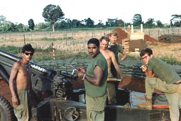 Ban Me Thout
Gun Section smoke break!  Far left: UNK from Puerto Rico, center is Top (liked cigars, good guy, too), Dewey Ball (middle, bare chest), cannoneer on the right (foot on trail) is Bob Brown.
