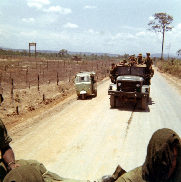 Convoy plus
My best guess is the convoy to Ban Me Thuot and a couple guns on the way.  The little Lambretta looks puny compared to our military vehicles.
