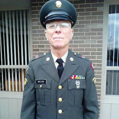 Modern Day John "Moon" Mullins
John proudly poses in his uniform (notice that it actually fits!) for Veteran's Day, 2012.  Looking good, John!
