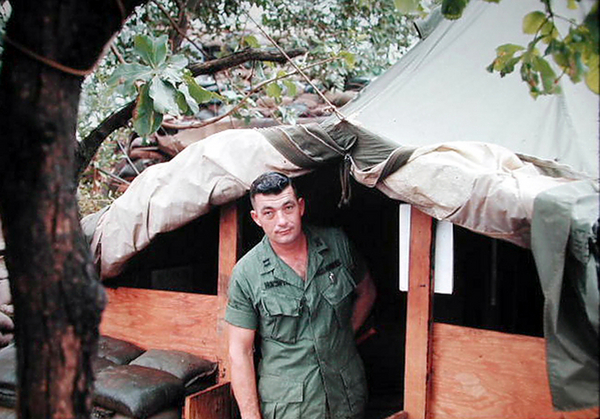 You Rang?
Capt David A. Horswell, Battery Commander of "B" Battery, steps outside the hooch.
