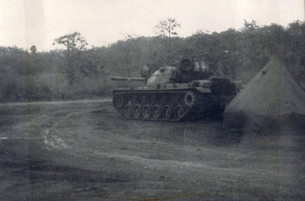 Guardian Tank
An M-48 tank is standing guard on Hwy 19 at the An Khe Pass.  New Year's Day, 1967
