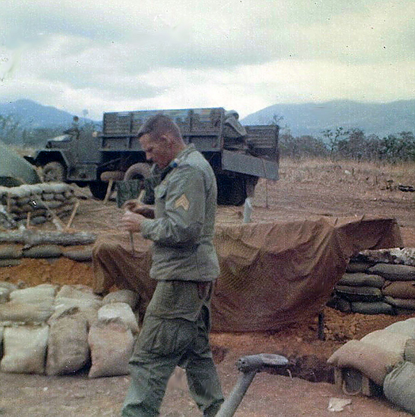 Sgt Charles R. Holt
Section Chief Charles Holt walking and smoking.
