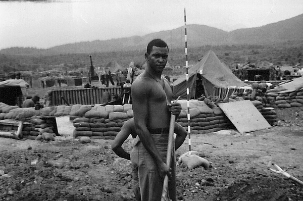 LZ Uplift
Sp4 Ernest L. Johnson working around gun pit.  Phu Cat area, late March 1967.
