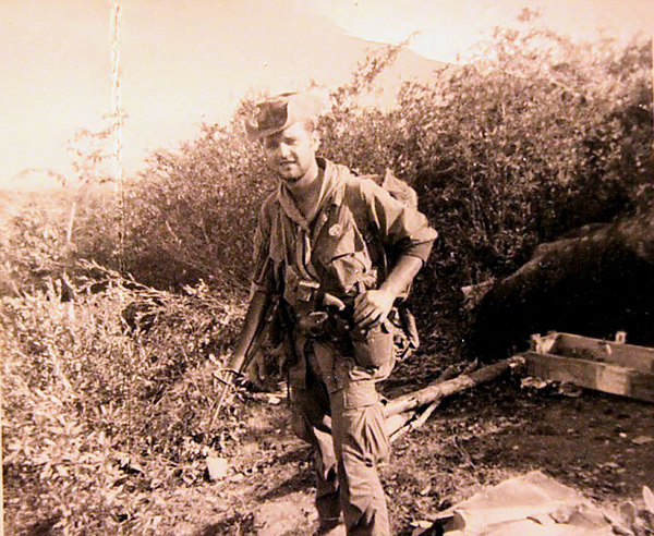 Bush Hat
Ready for the bush, obviously.  Here, "Doc", (Ireland?) the medic, is packed & ready.  Notice the western style pistol tucked in the belt.
