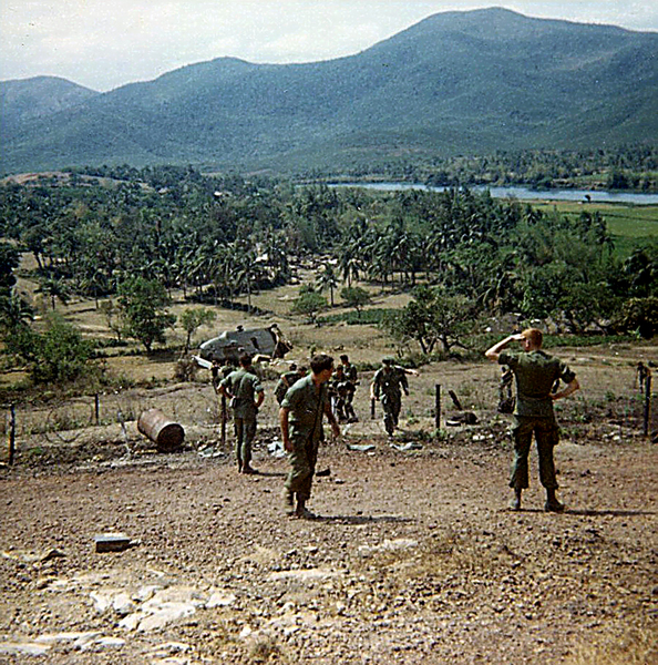 LZ English - Bong Son
Look in my photo here and you'll see the SAME red-headed officer we used to call "Carrot Top". Don't recall his real name.  Any idea who he was?

Ans> Yep!  That is Lt Chris Herrick.

