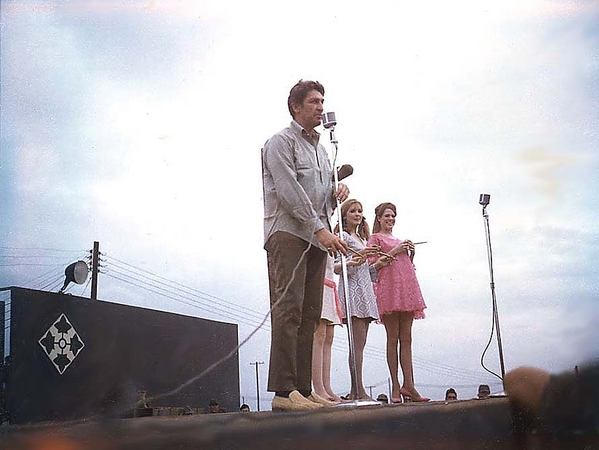 GI Blues go away
This show was hosted by a Hollywood actor and three starlets.  Don't remember any names.  They sang, danced, told jokes and enthralled the GIs who desperately needed some cheering up and American entertainment.
