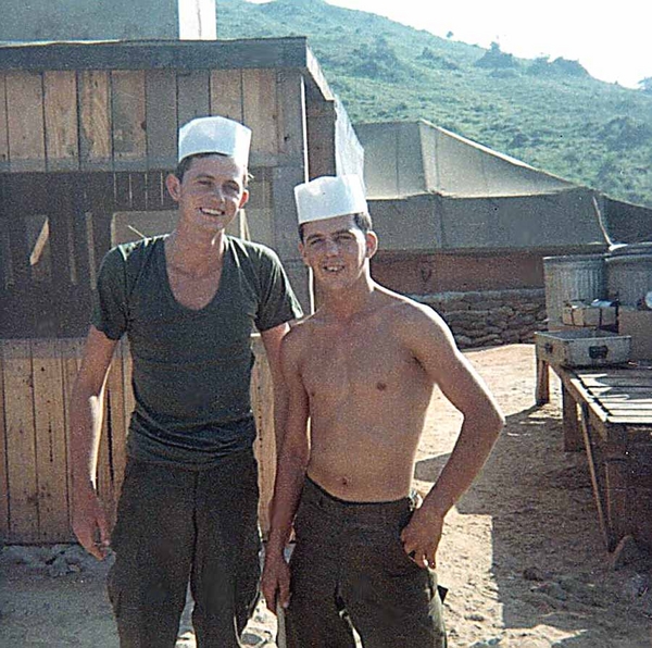 KIA Charles "Bruce" McClurg?
I believe this MAY be a foggy shot I took of  KIA Charles "Bruce" McClurg on the right. I can't remember the fellow's name on the left. They were both on KP duty this day at Duc Pho.

