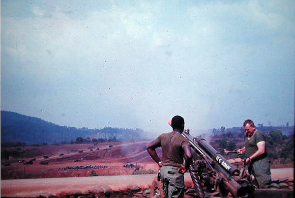 Returning Fire
Everybody wants to get in on the action.  Looks like he's using a hammer to operate the howitzer.
