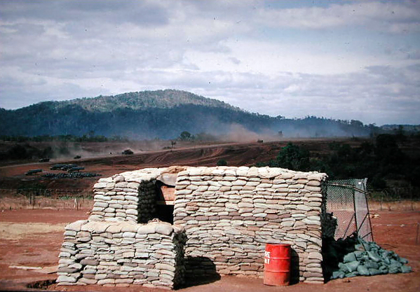 Oasis perimeter bunker
Perimeter Bunker at the “Oasis” looking East towards the highway and The Village, at the returning convoy.


