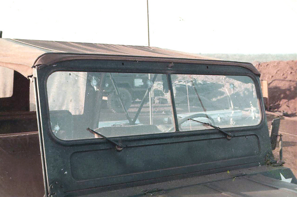 Attack on The Oasis
Lt. Friend’s (the engineer) Jeep.   He and his RTO were in it, note the bullet holes.  {See also MK-267}
