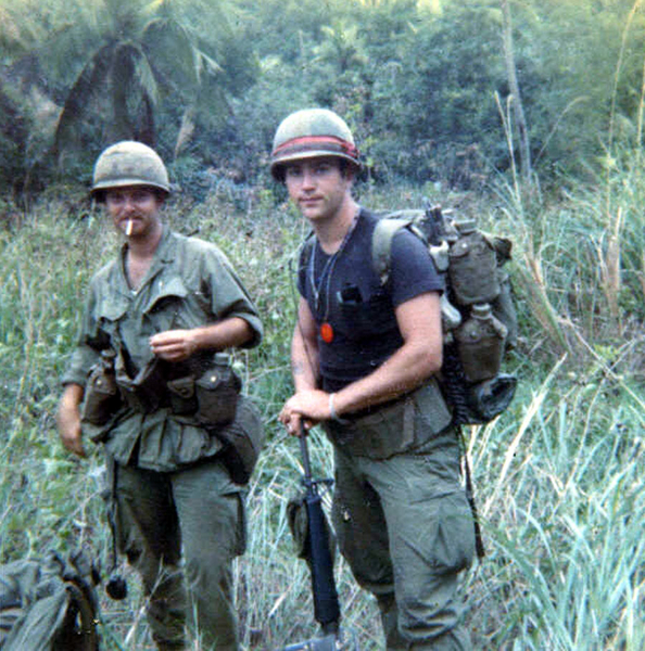 In the Boonies
My M-16 isn't loaded.  Er, I hope it isn't loaded.   FO Lt Joe Hannigan on the left.
