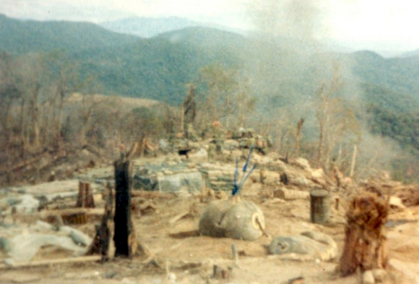 LZ Mile High
We moved to LZ Mile High.  That is LZ Incoming in the background---the bald spot on the hill.  The "Daisy Cutter" bomb that cleared this site left us some serious challenges to make a home!  Would have killed for a chain saw.
