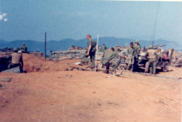 LZ Incoming
On LZ Incoming just before the shit hit the fan.  Lt George in center; Jimmy Loy is at right.  The FDC CONEX hole is in on the left.
