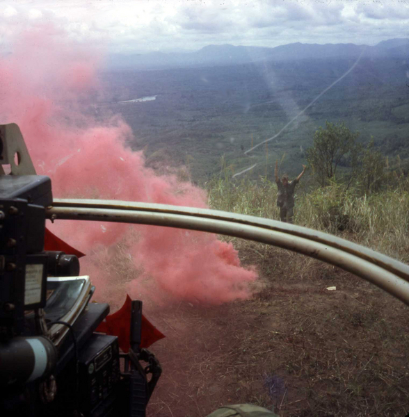 Popping Smoke
Pilot brings chopper down to hilltop as Wayne Shea provides final approach instructions.
