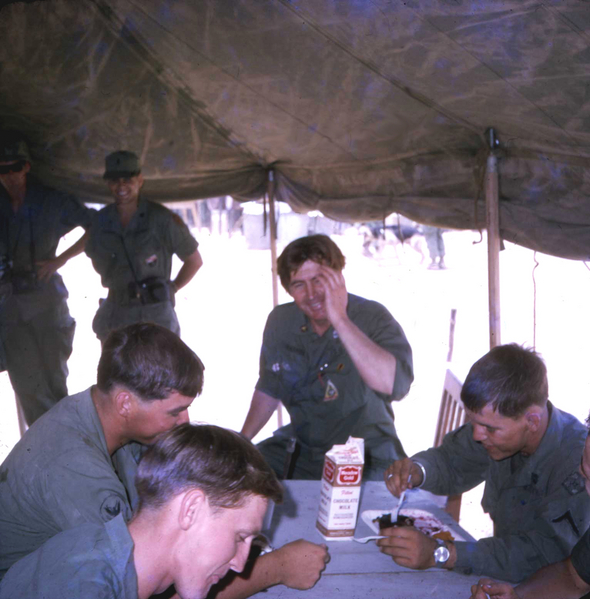 Missing the Coonskin Cap
Celebrity Fess Parker of "Davy Crockett" fame came to visit.  He brought us some melted chocolate ice cream.  You can see that we didn't mind that at all.
