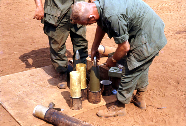 Fuze Setting
Screwing in the fuze in a 105mm howitzer round.  No good without it.
