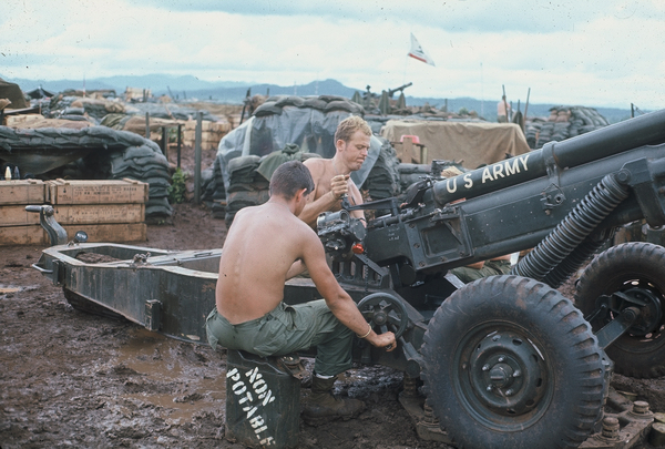 LZ Ranger @ Ban-me-Thuot
Men-At-Work.  Close coordination between cannoneers makes for a successful gun crew.
Water can says "Non Potable".  Of course, that applied to most things in Vietnam.
