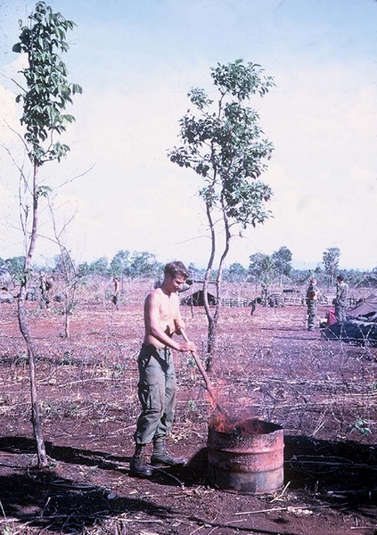 A Well-Known Detail
"Well, someone has to do it!".   The most famous-infamous detail of all Vietnam....the "shit-burning" detail.  Larry Kettner does the honors.
