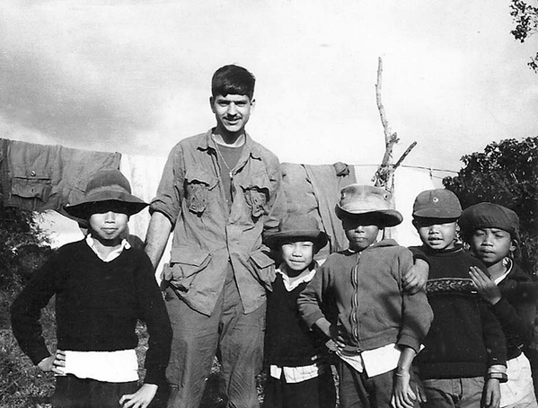 They like hats
Date: 29Nov68  Location: Duc Minh
These are a few of my Vietnamese buddies.  Would you believe they like hats?
