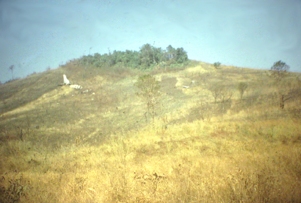 Bad Landing
Tail of doomed aircraft can be seen at upper left at crest of the hill.
