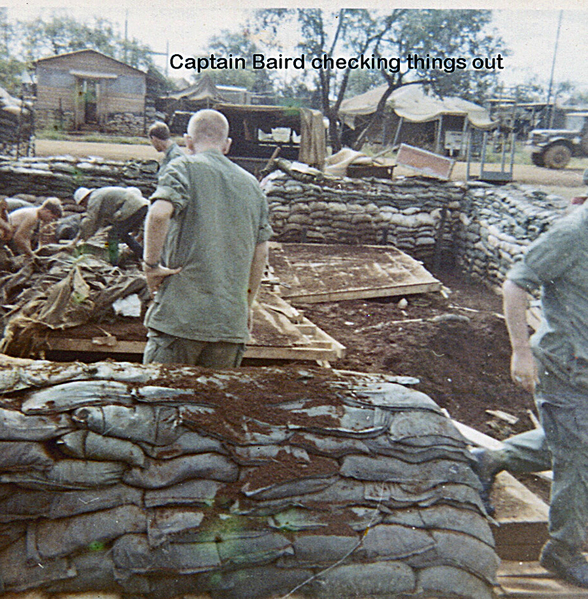 Aftermath
Capt Baird looking through damaged areas.
