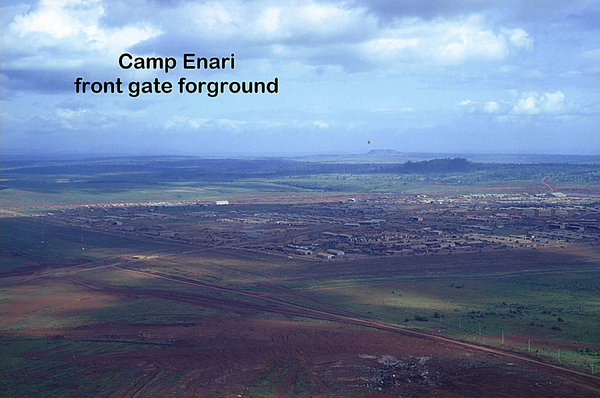 Camp Enari
Front Gate in the foreground.
