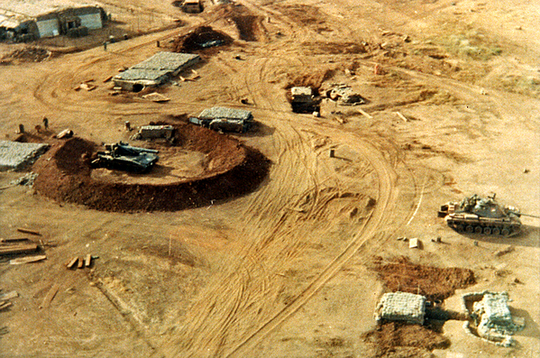 Big Boomers
A berm surrounds an 8-inch self-propelled.
