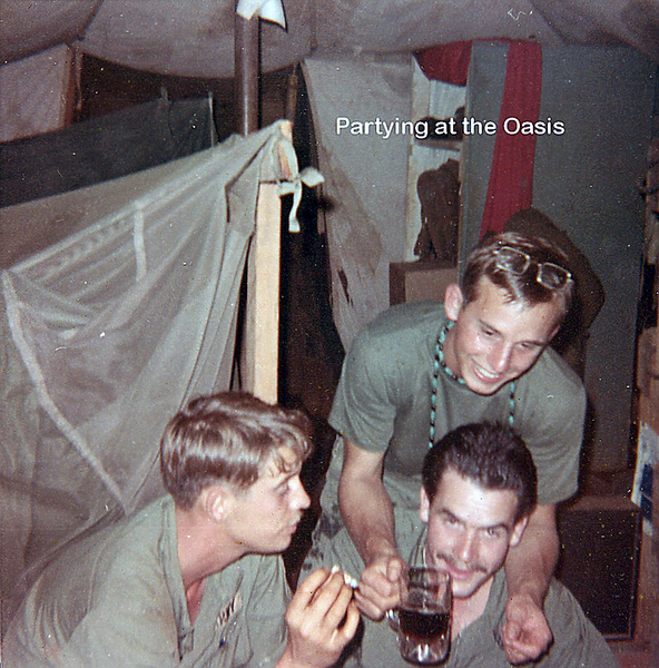 Party Time
Party time at the Oasis.  Note the mosquito netting in the background.
