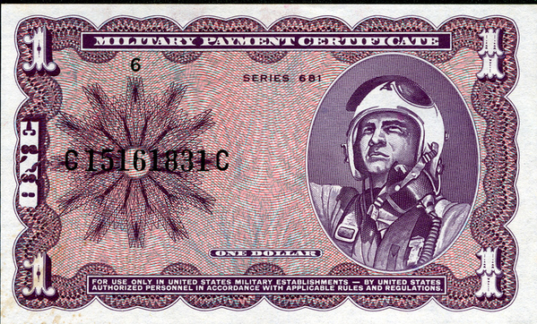 MPC
Often called "monopoly money", this is a "military payment certificate".  Troops were not allowed to have US currency in-country; strictly forbidden.   Unless you chose direct deposit, pay officers actually came out to the field and held "pay call".
