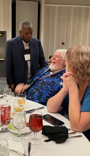 Meeting an old friend
Ernest Correia (TOC-HHC) chats with Gary "Dean" Springer.  Old war veterans meet again at the 35th reunion.
