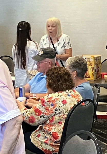 You Want 200 Raffle Tickets??
Martha Henderson, widow of Past President Joe Henderson, volunteers at the Raffle Sales table.  The value of the "50-50" raffle this year was $1,300.00.  There were two winners (one late claimant).  Both agreed to donate the prize to the 35th Infantry Regiment Association.
