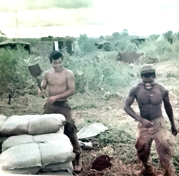 Mishima and Philpot
Ronnie Mishima and Philpot...working on those sandbags!
