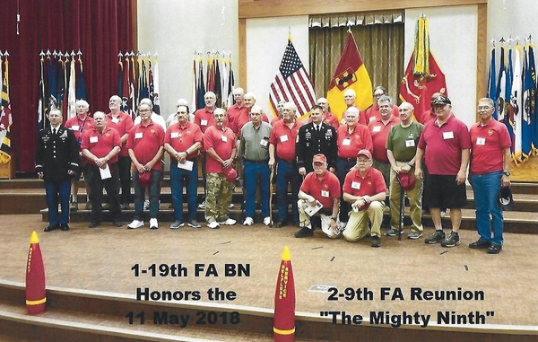 1/19th FA honors the 2/9th FA
The 1/19th FA, Jerry Orr's old unit, commemorated our 2018 visit with a group photo.  The highlights of sharing our reunion time with the 1/19th FA included meeting the trainees at the Dining Facilities, observing their marksmanship training skills at the firing range, attending a graduation, and...most of all...serving as a Group Panel to permit a new class of Trainees to ask any questions they wanted from a group experienced combat veterans.  The Battalion Commander made all of us "honorary members" of the 1/19th and we are welcome to return at any time.
