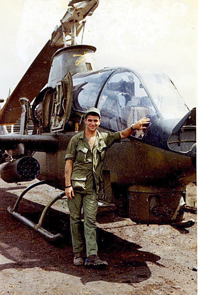 Aircraft at An Khe runway
Rick admiring the Cobra before the sapper attack.
