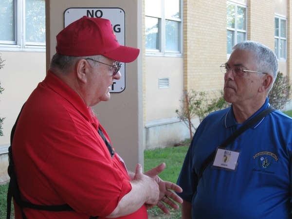 Arrival
Redleg Doug Turner makes a point with Bill Henson, the Immediate Past President of the 35th Infantry Regiment Assn.  We were honored to have him join us for our Encore Reunion.
