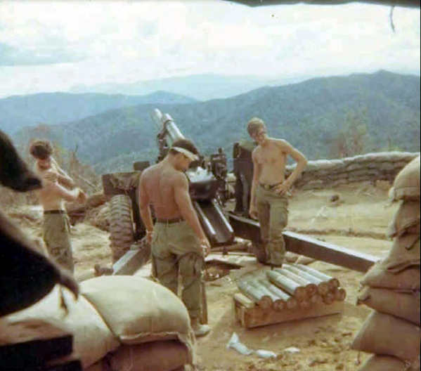 My Gun Section
Phil Orville, Carlos Casteel and Sandy waiting on a fire mission.  I took the picture from inside the bunker.  Sandy was wounded on LZ Incoming.
