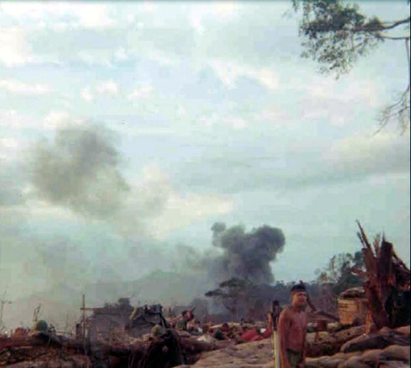 Too close for comfort
Carl Willis is in the foreground. Artillery rounds going off right outside our perimeter after moving to LZ Mile High.
