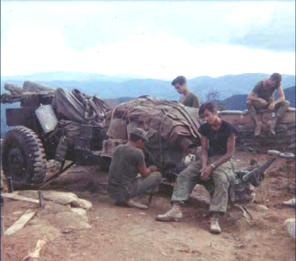 Leaving the LZ
Getting ready to move off LZ Mile High.  L to R: Carlos Casteel, Bob Becker, Charlie South and UNK.
