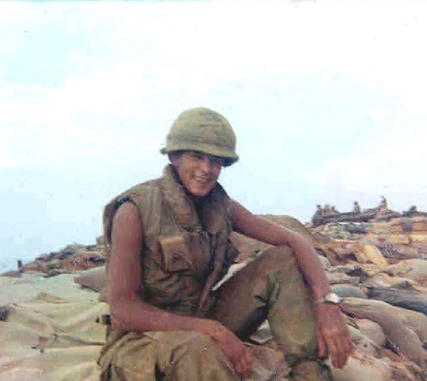 Sitting pretty
Bob Becker sitting atop a personnel bunker.
