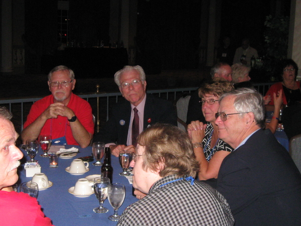 Redleg Banquet Table
FO Dennis Munden in his Arty shirt next to "Moon" Mullins.  That's Joe Turner in the dark suit.
