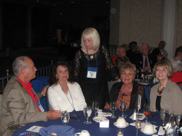 Saturday Evening Banquet
Martha Henderson, wife of Joe Henderson, takes a moment to speak with Mike Kurtgis, Lorraine Knight, Barb Keith, and Jackie Dauphin at the redleg table.
