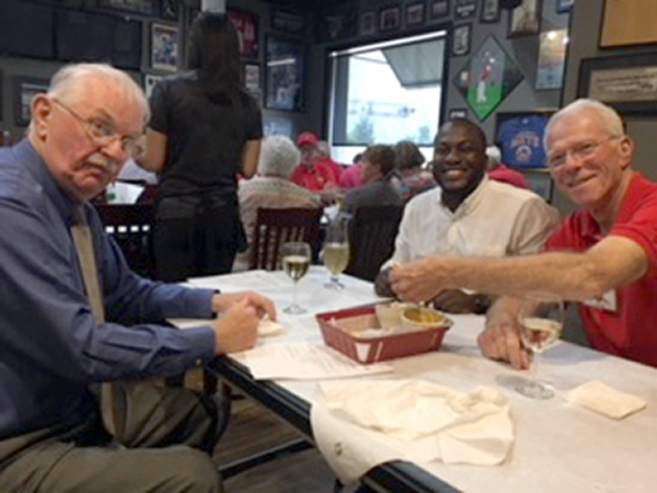 Mike's Sports Grill
John Cashin, Waheed Gbadimosi, and John "Moon" Mullins

Photo courtesy of Carlton Epps
